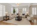 Bright living room featuring hardwood floors, neutral paint, and shuttered windows at 4974 Dovecote Trl, Suwanee, GA 30024