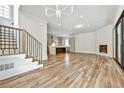 Open living room featuring hardwood floors and a fireplace at 2179 William Way, Atlanta, GA 30345