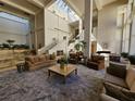 Spacious lobby with comfortable seating and high ceilings at 1280 W Peachtree W St # 1407, Atlanta, GA 30309