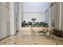 Lobby area with seating, plants, and a tranquil atmosphere at 1280 W Peachtree W St # 1407, Atlanta, GA 30309