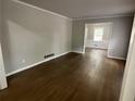 Bright living room featuring hardwood floors and neutral color palette at 2812 Arlington Rd, Atlanta, GA 30344