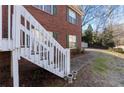 White wooden staircase leading to home entrance at 1012 Crown River Pkwy, Mcdonough, GA 30252