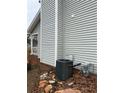 Home exterior featuring an air conditioning unit at 2615 Leeshire Ct # 1, Tucker, GA 30084
