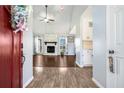 Bright and spacious entryway with red door and hardwood floors at 30 Graystone Dr, Covington, GA 30014