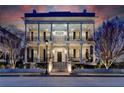Elegant two-story home with stately columns and a charming front porch at 3959 Saint Elisabeth Sq, Duluth, GA 30096