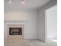 Living room fireplace with marble surround at 286 Heathridge Se Ln, Mableton, GA 30126