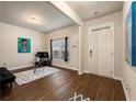 Bright living room with hardwood floors, fireplace, and ample seating at 3720 Liverpool Way, Atlanta, GA 30331