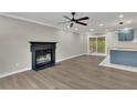 Living room with fireplace and kitchen island at 4913 Windsor Downs Dr, Decatur, GA 30035