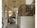 Bright and spacious entryway with hardwood floors, elegant staircase, and large mirror at 1814 Tristan Se Dr, Smyrna, GA 30080