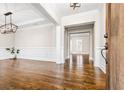 Elegant foyer with hardwood floors, decorative molding, and an open floor plan at 337 Ellis Preserve Sw Ln, Marietta, GA 30064