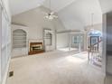 Bright living room featuring high ceilings and hardwood floors at 3905 Colonial Sw Trl, Lilburn, GA 30047