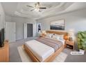 Large main bedroom with walk-in closet and ceiling fan at 3905 Colonial Sw Trl, Lilburn, GA 30047