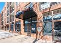 Modern building entrance with signage and secure access at 333 Nelson Sw St # 404, Atlanta, GA 30313