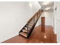 Modern open staircase with wood treads and metal railing at 333 Nelson Sw St # 404, Atlanta, GA 30313