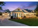 Beautiful home featuring a well-manicured lawn, a three-car garage, and inviting curb appeal at 101 Barker Rd, Cumming, GA 30040