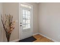 Bright foyer with hardwood floors and access to the main living area at 1246 Adcox Sq, Stone Mountain, GA 30088