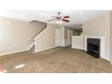 Spacious living room with carpet, fireplace, and neutral walls at 2852 Vining Ridge Ter, Decatur, GA 30034