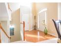 Bright and airy entryway with hardwood floors and staircase at 342 Holbrook Rd, Smyrna, GA 30082