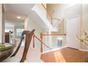 Open staircase with wooden railings and hardwood floors at 342 Holbrook Rd, Smyrna, GA 30082