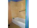 Bathroom with built-in shower and grab bar at 4751 Brownsville Rd, Powder Springs, GA 30127