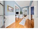 Bright entryway with hardwood floors, leading to living areas at 4605 Woodlawn Gates Ln, Marietta, GA 30068