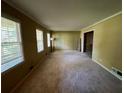 Spacious living room with large windows at 4198 Wellington Hills Ln, Snellville, GA 30039