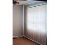 Empty living room with hardwood floors and window coverings at 1604 Pine Tree Trl, Atlanta, GA 30349
