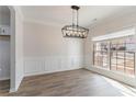 Bright dining room features a chandelier and large window at 2839 Suttonwood Way, Buford, GA 30519