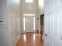 Spacious foyer with hardwood floors and high ceilings at 100 Meadow Lake Dr, Carrollton, GA 30116