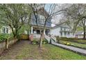 Two-story craftsman style home with walkway and landscaping at 107 Howard Ne St, Atlanta, GA 30317