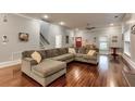 Spacious living room featuring hardwood floors and a comfortable sectional sofa at 107 Howard Ne St, Atlanta, GA 30317