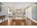 Spacious living room with hardwood floors and built-in shelving at 1883 Acuba Ln, Atlanta, GA 30345