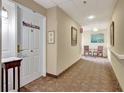 Building hallway with carpet and artwork at 1800 Clairmont Lk # A-519, Decatur, GA 30033