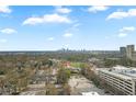 Stunning aerial view showcasing cityscape and surrounding area at 250 Pharr Rd # 1516, Atlanta, GA 30305