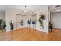 Bright living room featuring open floor plan, breakfast bar, and modern light fixture at 3481 Ne Lakeside Dr # 1508, Atlanta, GA 30326