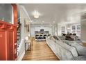 Open living space with hardwood floors and kitchen view at 2652 Tilson Rd, Decatur, GA 30032