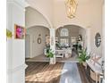 Bright and airy foyer with hardwood floors and view to living room at 2311 Shoreline Pkwy, Villa Rica, GA 30180