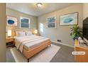 Virtually staged main bedroom with light walls and plush bedding at 24 Valerie Ln, Powder Springs, GA 30127