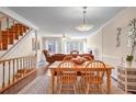 Bright dining area with hardwood floors and view of living room at 2464 Cedar W Brk, Marietta, GA 30067