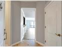 Inviting entryway with a view into the living area featuring hardwood floors and neutral paint colors and decor at 3475 Oak Valley Ne Rd # 1930, Atlanta, GA 30326