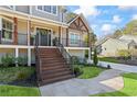 Elegant entryway with stone pathway and a welcoming front door at 3051 Maple Ln, Alpharetta, GA 30009