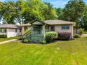 Inviting home featuring a quaint front porch and lush landscaping, enhancing its curb appeal at 1770 Rockland Se Dr, Atlanta, GA 30316