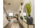 Bright entryway with hardwood floors, a console table, and a large mirror at 2460 Bayberry St, Acworth, GA 30101