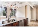Updated kitchen with granite countertops and a double sink at 32 Peachtree Nw St # 308, Atlanta, GA 30303
