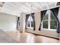 Bright living room featuring hardwood floors and large windows at 32 Peachtree Nw St # 308, Atlanta, GA 30303