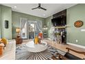 Stylish living room features modern furniture, a minimalist fireplace, and an inviting entertainment area at 2199 Lenox Ne Rd # 13, Atlanta, GA 30324