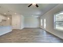 Open living room with hardwood floors and access to backyard at 4361 Portsbrook Ave, Snellville, GA 30039