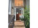 Entrance featuring stairs to the second floor, chandelier, and views to the main level at 571 Oak Vista Ct, Lawrenceville, GA 30044