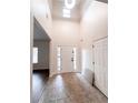 Two-story entryway with tile flooring, and hardwood floors at 3405 Summer Brooke Way, Union City, GA 30291