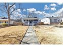 Inviting home with a well-maintained front yard, classic design and a picturesque setting at 2507 Maple St, Atlanta, GA 30344